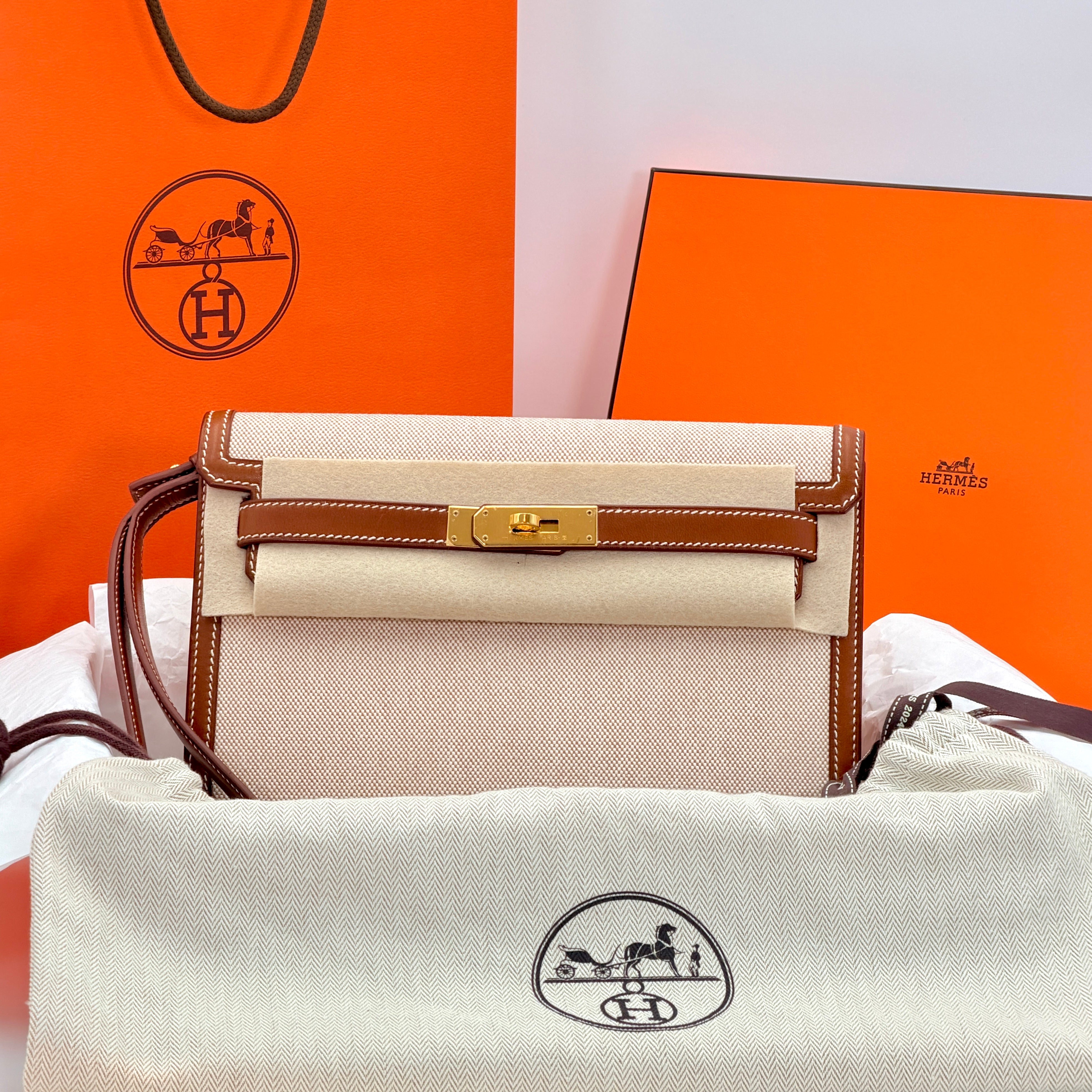 Hermès Kelly Depeches 25 Pouch Barenia Fauve Ecru Beige Toile H GHW (Discontinued Model)